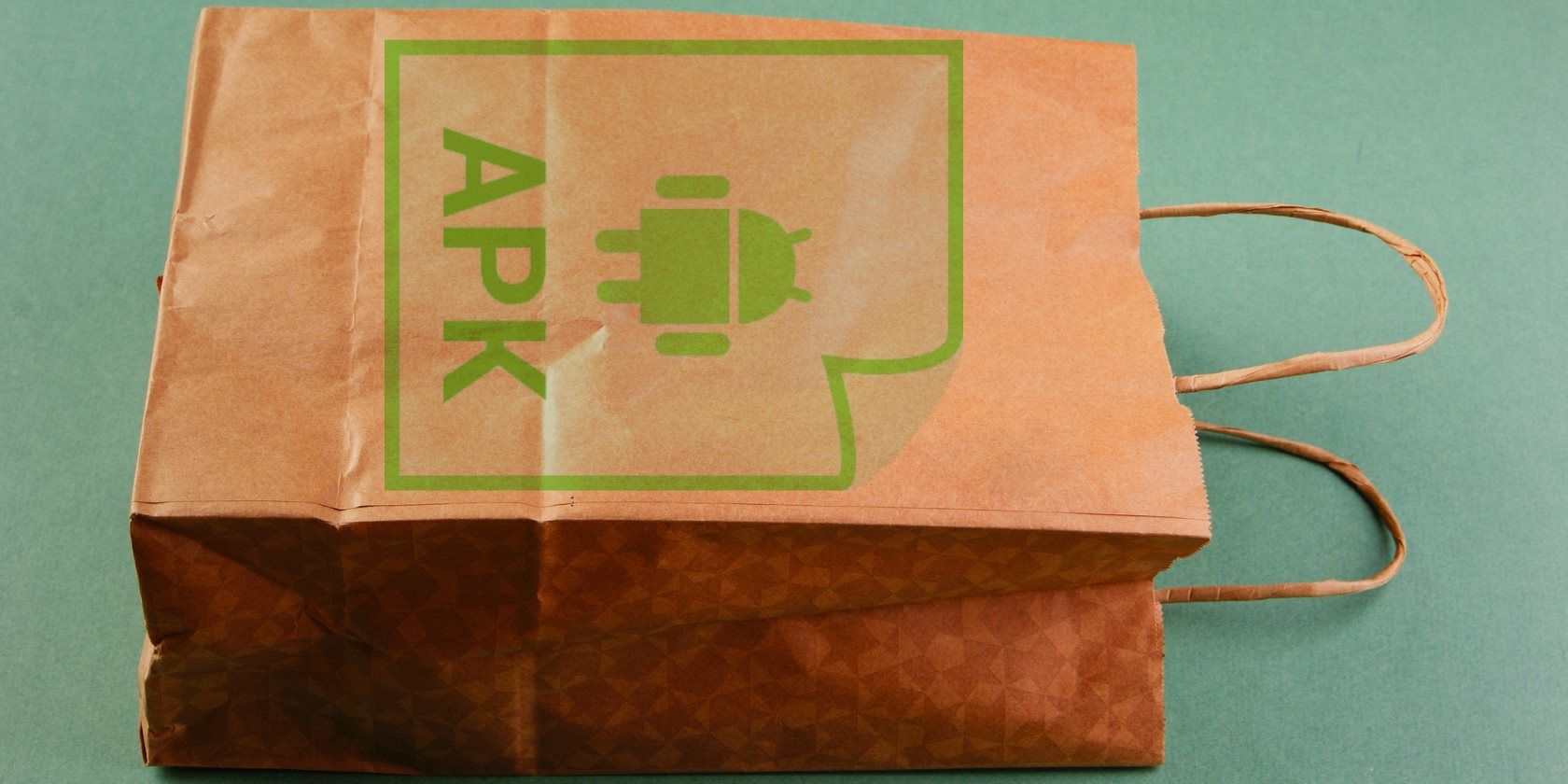 Tệp APK là gì và nó được sử dụng để làm gì? Giải thích Paper bag with the Android logo and APK written on it