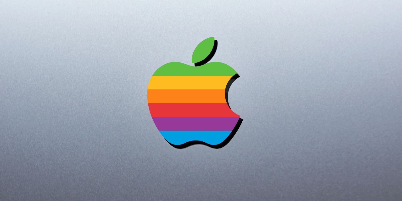 Apple rainbow logo on grey background
