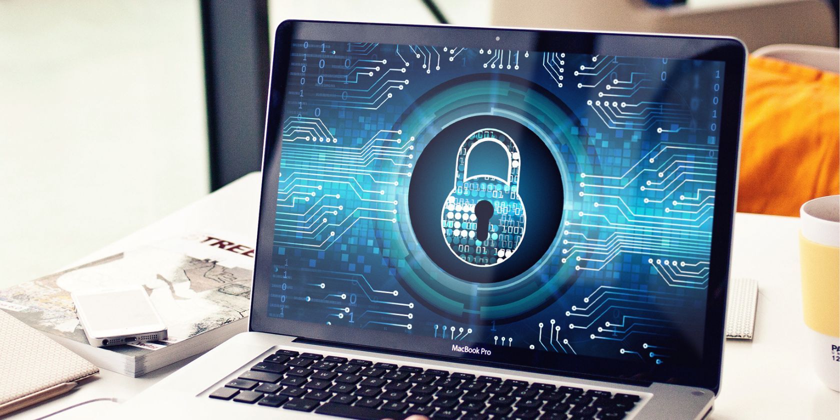 blue lock graphic on laptop on desk