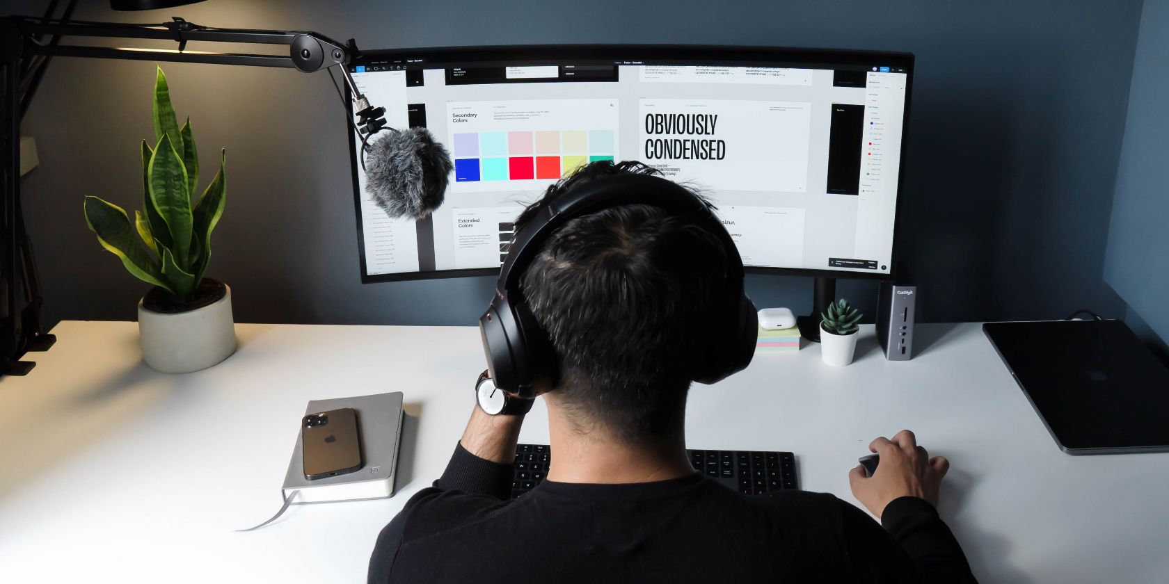 photo of a graphic designer working on their computer