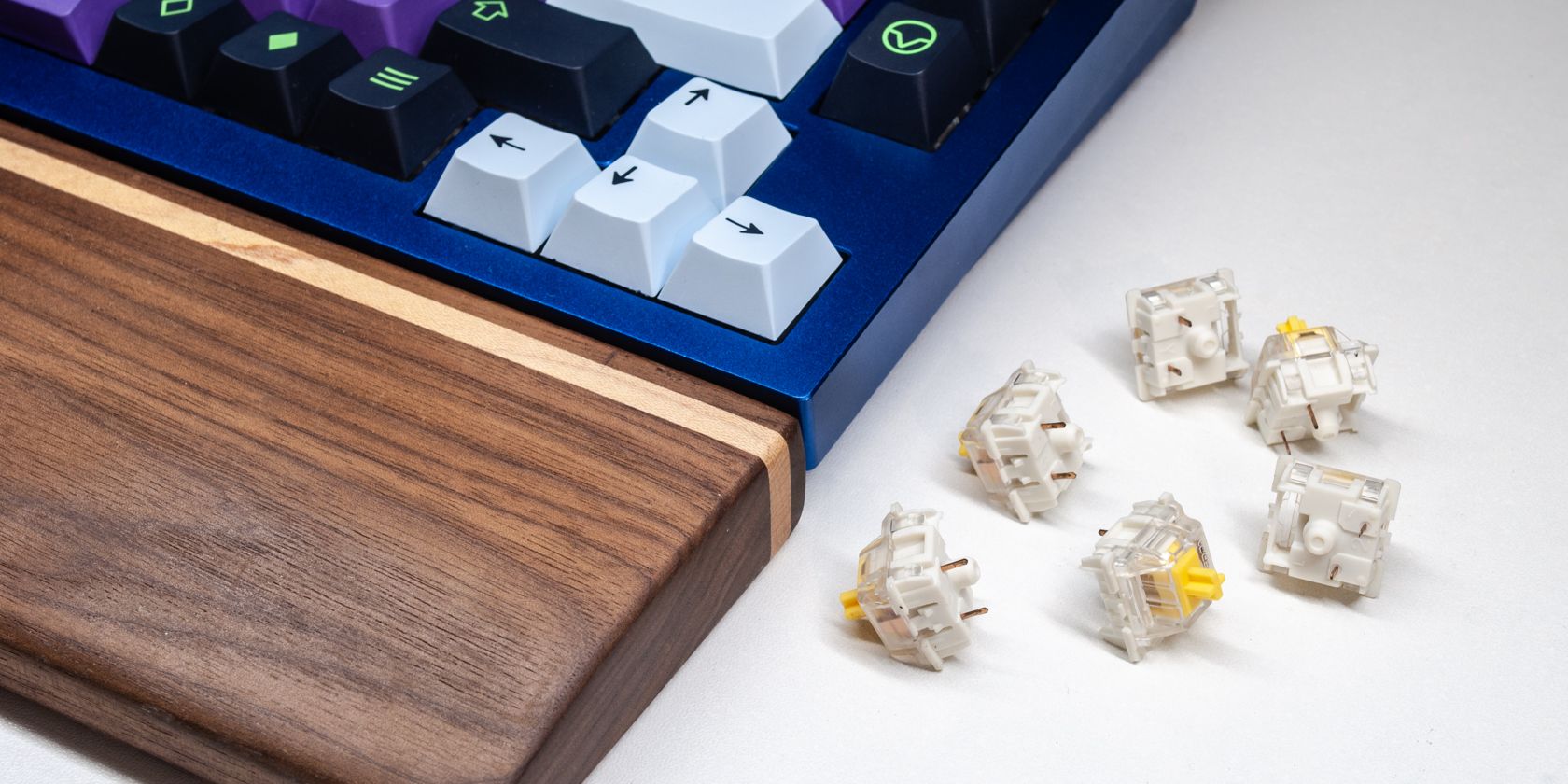 gateron yellow switches beside keyboard and wrist rest-1