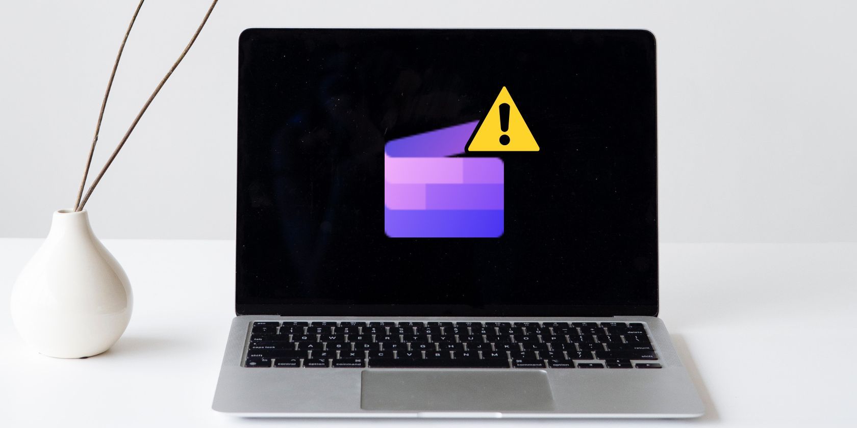 Không thể cài đặt ClipChamp trên Windows 11? Hãy thử các bản sửa lỗi này Windows 11 laptop with Clipchamp not installing error icon