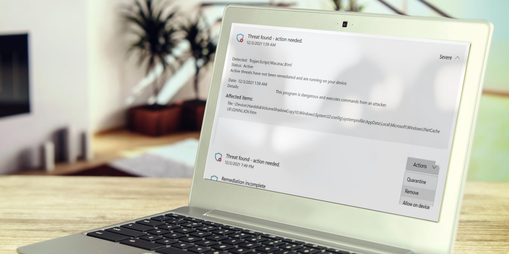 Trojan Wacatac.B!ml là gì? Cách xóa nó khỏi Windows Mockup of a Laptop Showing the Pop-up of Wacatac.B!ml Trojan Virus