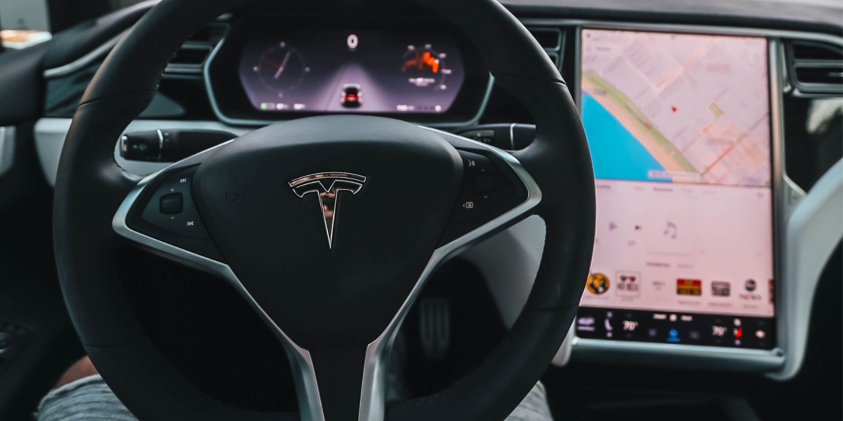 image of tesla steering wheel and dash