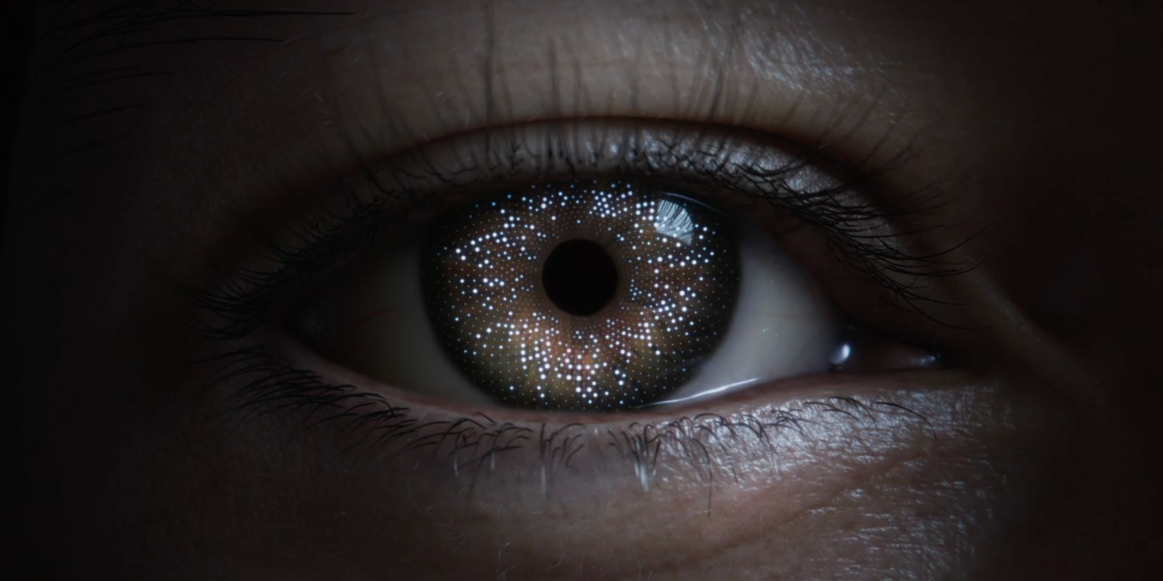ID quang là gì và nó hoạt động như thế nào trên tai nghe Vision Pro? a graphic showing a dotted mapping being made on the iris