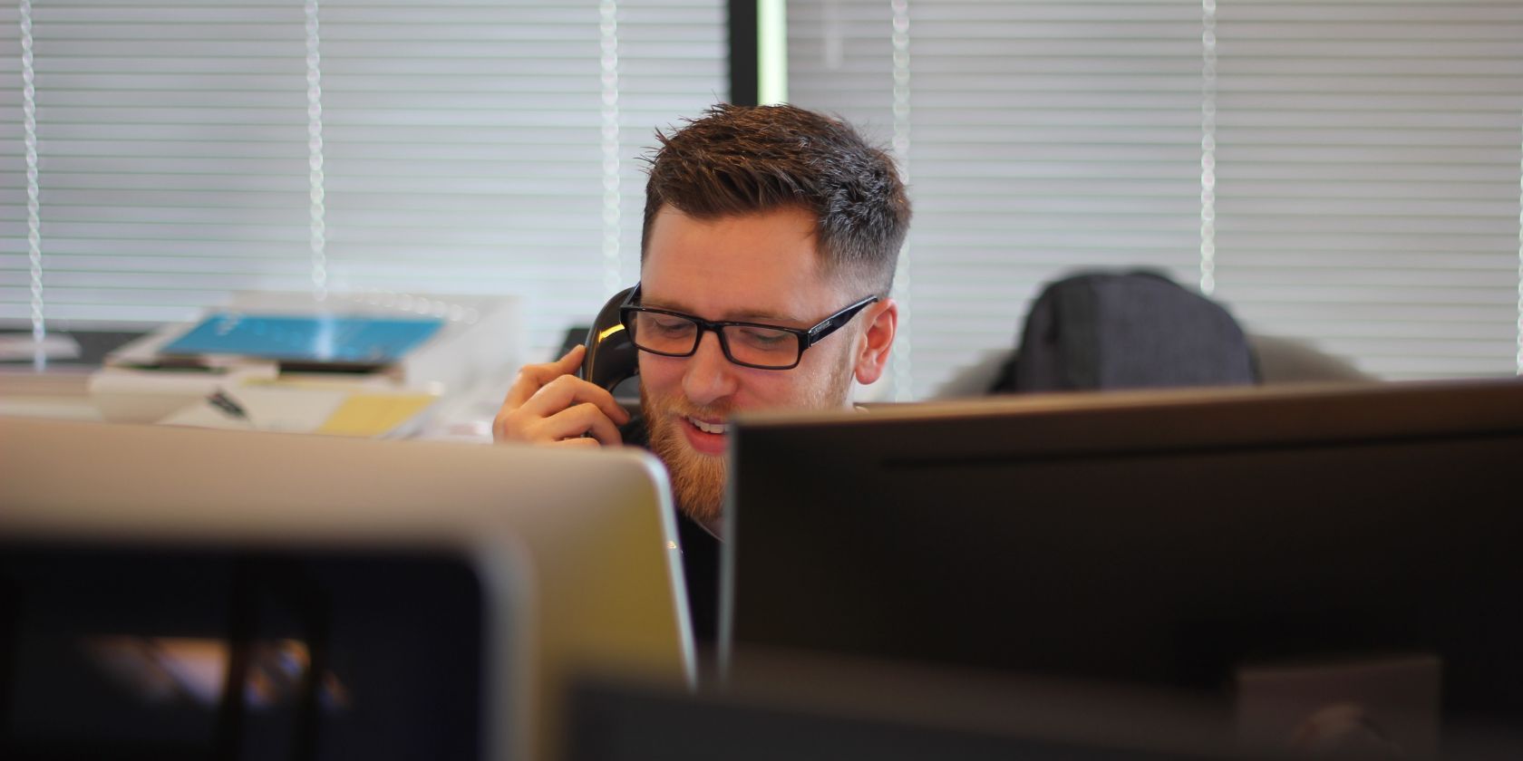 Man talking on a telephone