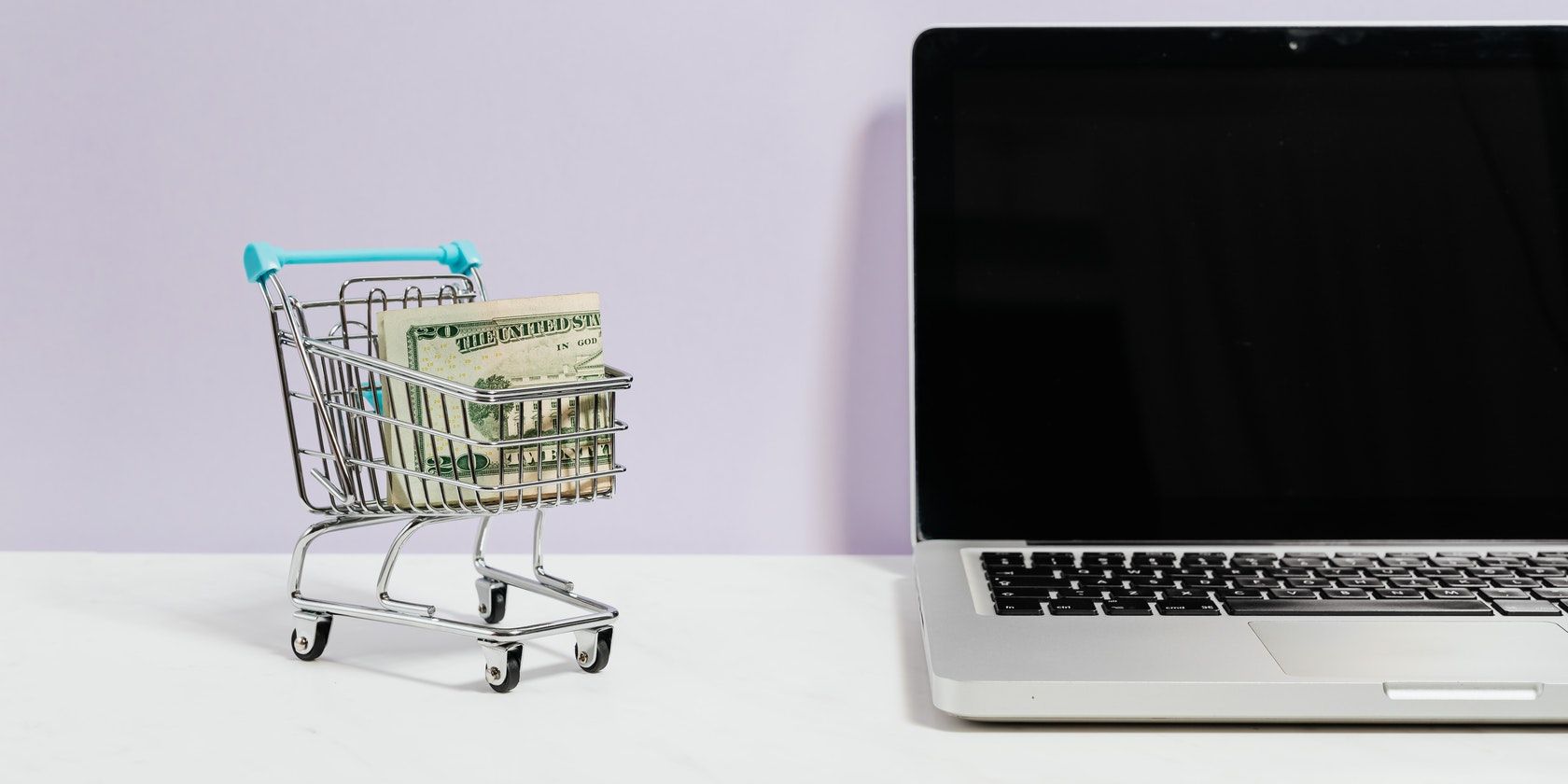 5 trang web tốt nhất để mua hàng số lượng lớn với giá bán buôn laptop shopping cart trolley money dollars