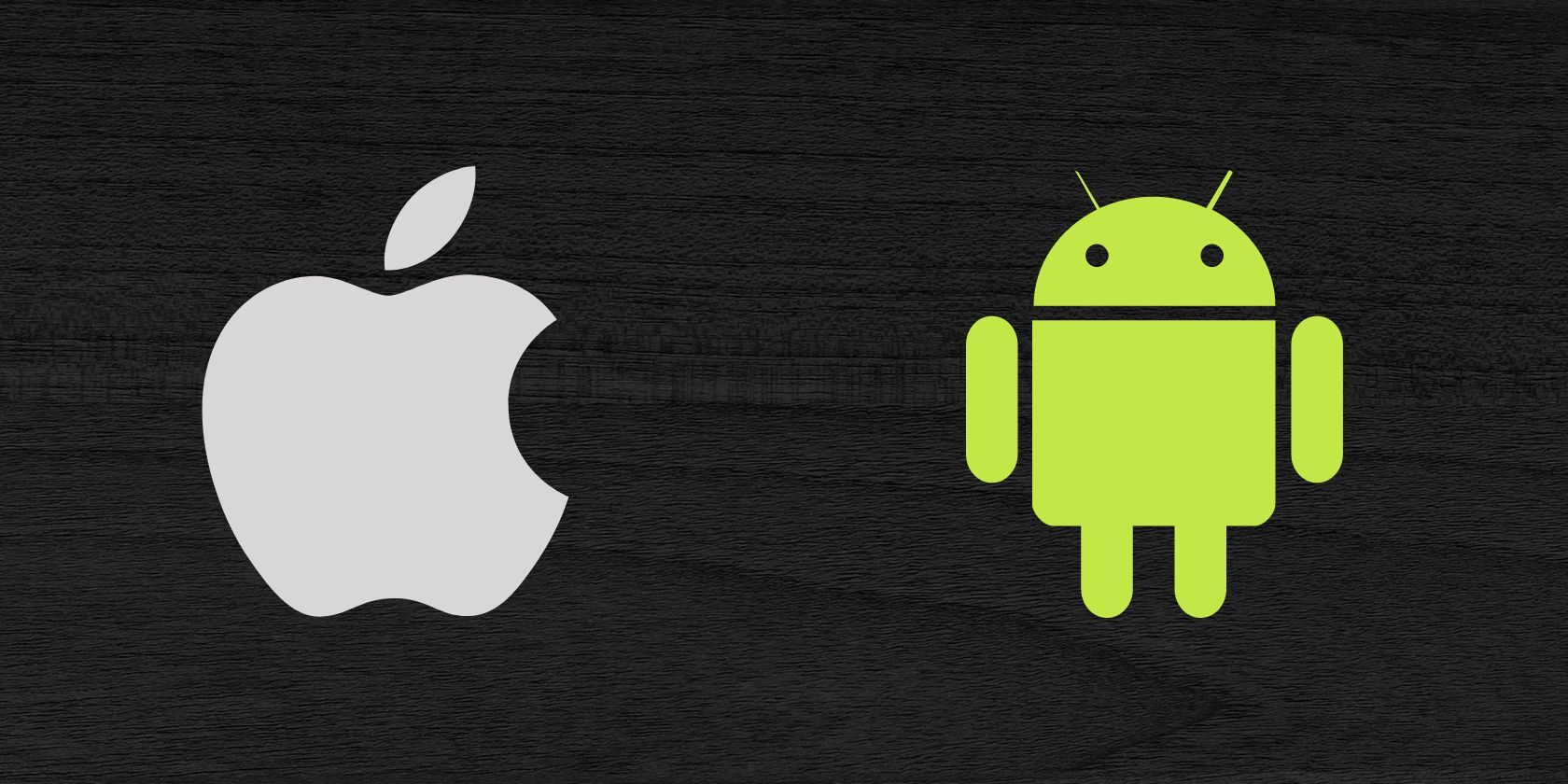 Logo Apple và Android nhìn thấy trên nền tối