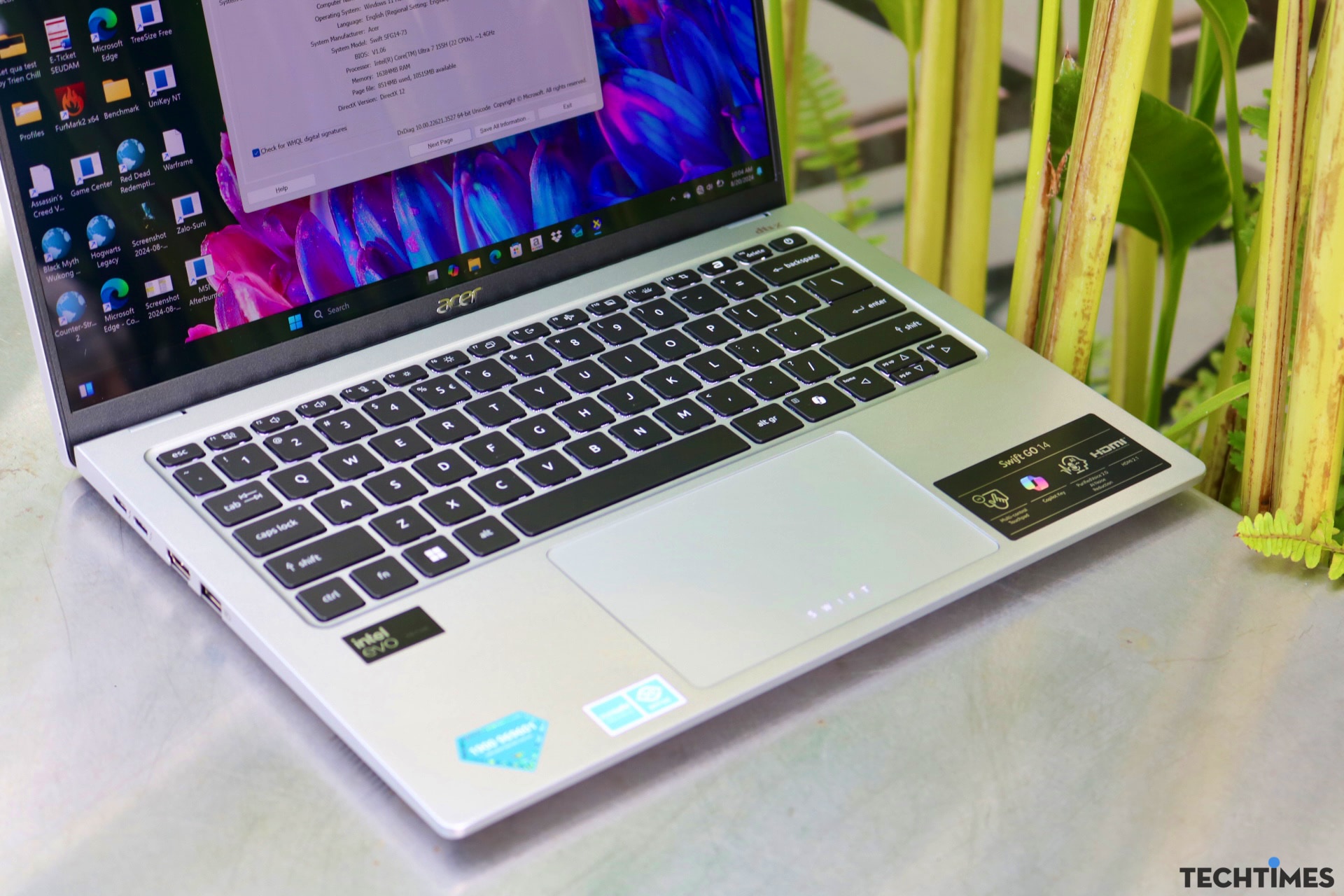 Đánh giá Acer Swift Go 14 AI OLED (SFG14-73): Màn hình đẹp, chức năng AI hữu ích TechTimes Vietnam Tổng quan khu vực bàn phím và touchpad cân đối và thuận tiện khi thao tác.