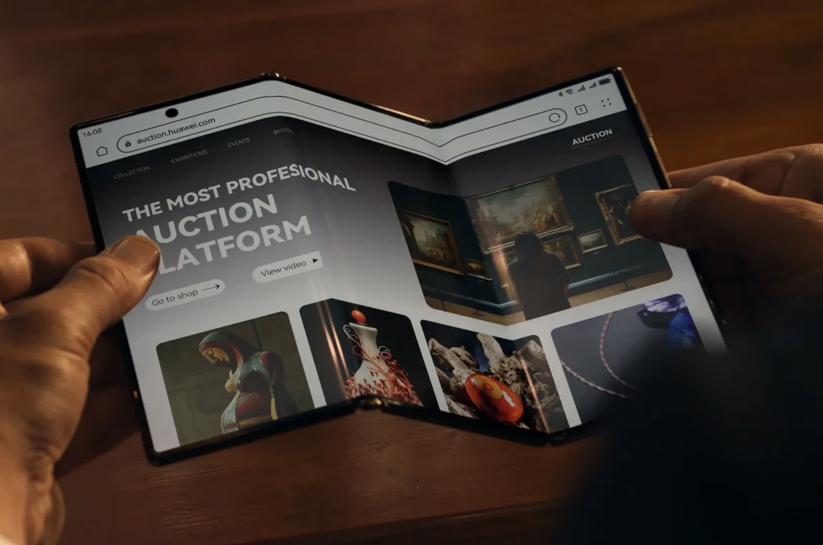 Huawei Mate XT Ultimate Design: Điện thoại gập 3 đắt hơn MacBook Pro 16 inch TechTimes Vietnam Huawei Mate XT Ultimate Design đang được mở ra.