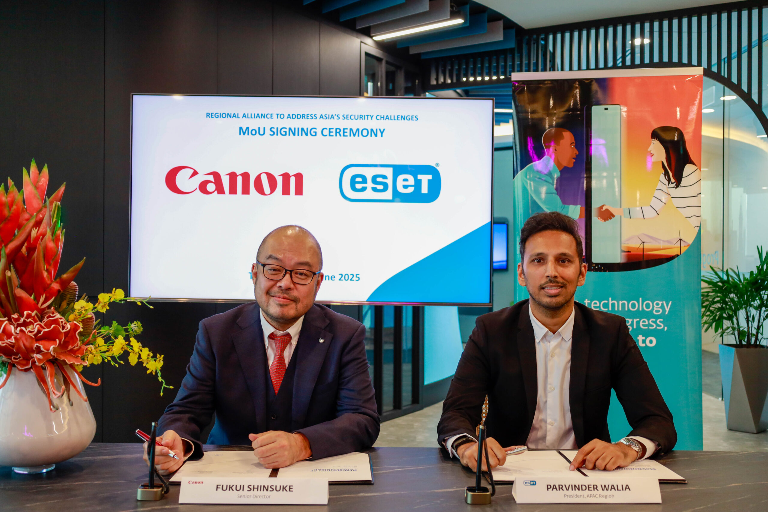 Canon Singapore and ESET signing a Memorandum of Understanding to broaden partnership to deliver security solutions across Asia. From left to right: Fukui Shinsuke, Senior Director, Regional Business Imaging Solutions, Canon Singapore; Parvinder Walia, President of the Asia Pacific Region, ESET