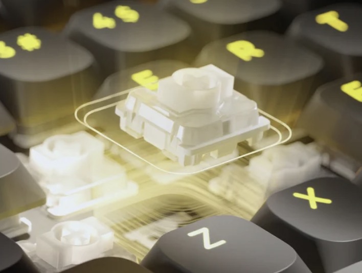 Một điểm đáng khen khác là phần keycap nổi theo kiểu floating keycap (phím nổi trên bề mặt), giúp hệ thống đèn RGB hiển thị đẹp mắt hơn nhưng vẫn giữ được vẻ tinh tế. Corsair không cố biến VANGUARD AIR 99 Wireless thành một “cỗ máy ánh sáng” quá phô trương. Thay vào đó, hãng hướng đến cảm giác hiện đại và sang trọng, phù hợp cả môi trường văn phòng lẫn góc gaming cao cấp.