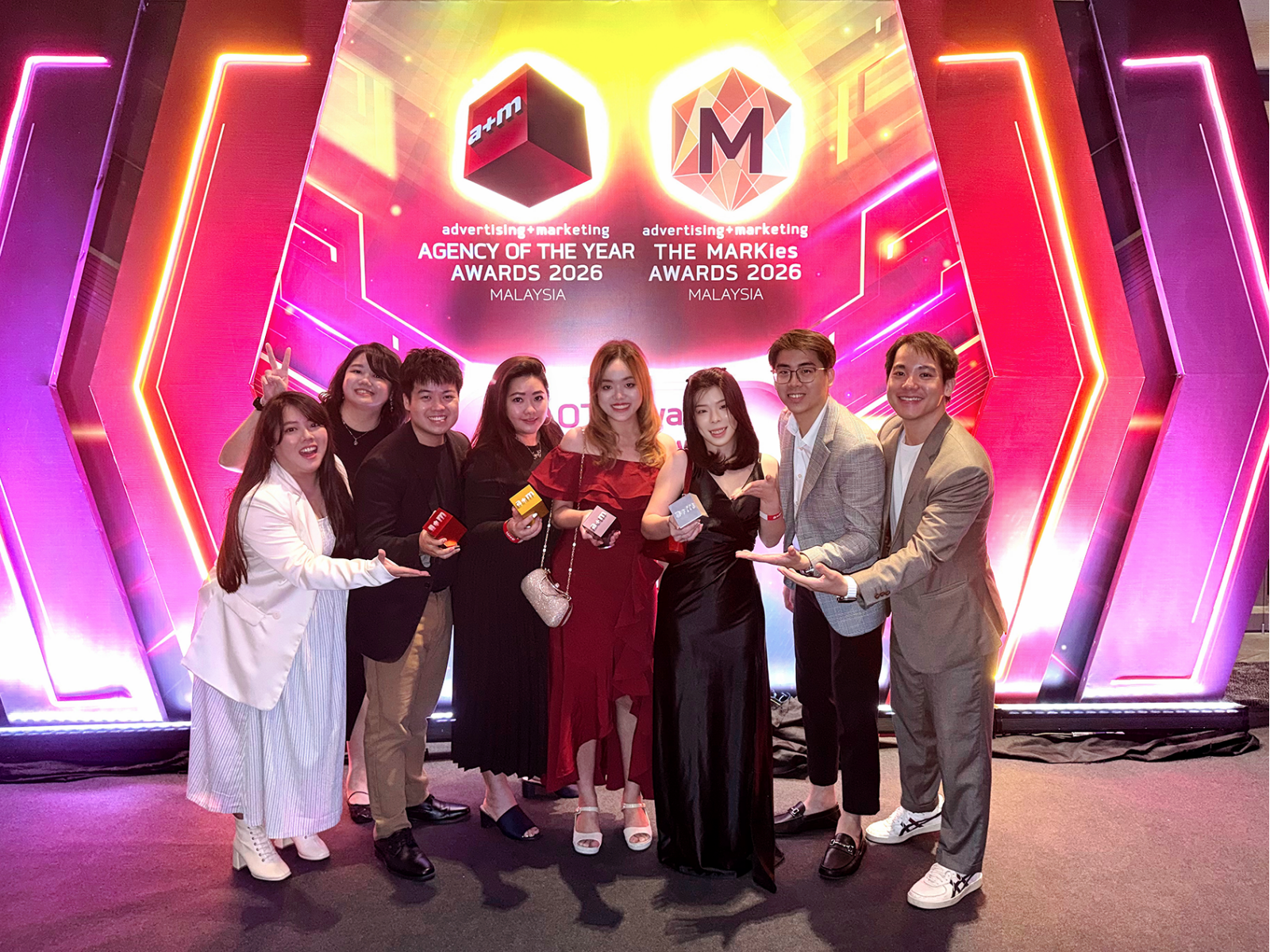 LOCUS-T (Malaysia) được nhận 4 giải thưởng tại Lễ trao giải Công ty Quảng cáo + Tiếp thị của năm 2026 TechTimes Vietnam LOCUS-T team members celebrating the 4 honours at the Advertising + Marketing (A+M) Agency of the Year Awards 2026, reflecting the collective achievement and dedication behind the recognition.
